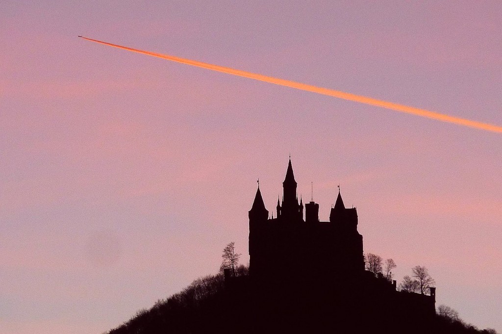 plane over castle